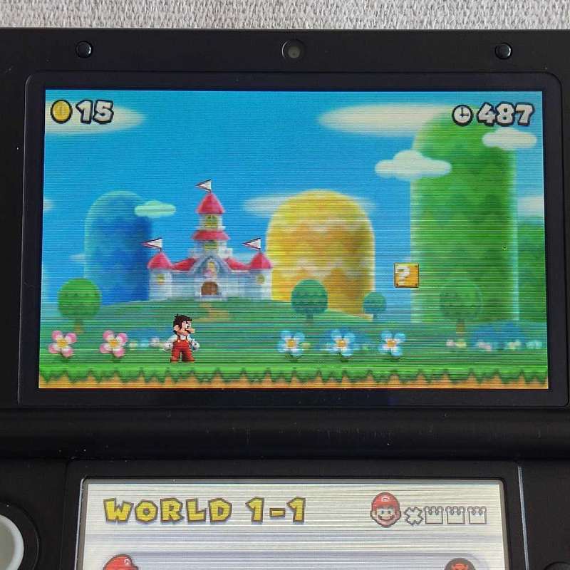 Nintendo 3Ds XL console with original charger