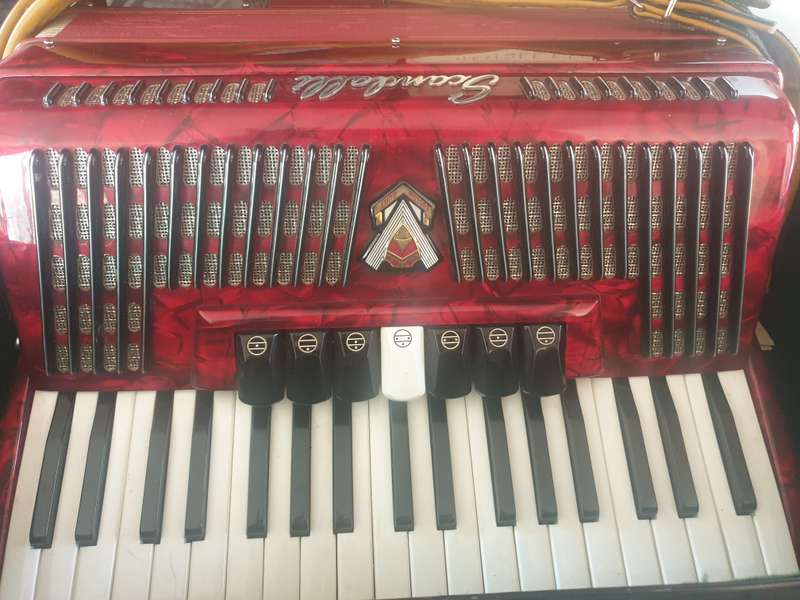 Accordian, Scandalli  96 bass in case with old music sheets