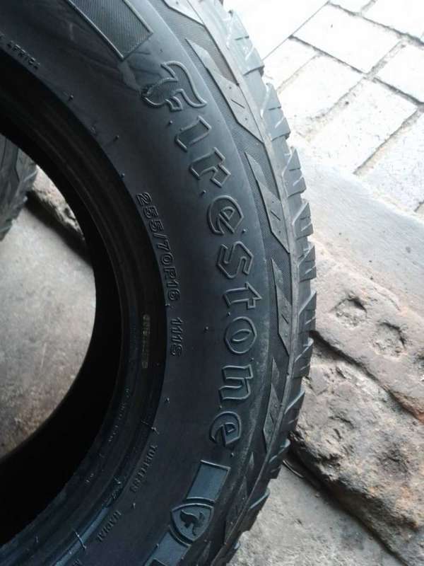255/70/16 Firestone AT Grip. 75% thread life