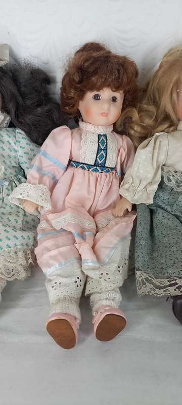 Trio of Porcelain Dolls