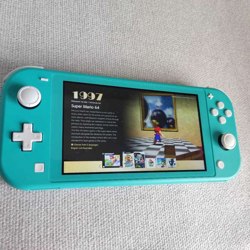Nintendo Switch Lite Console +Original charger and Box