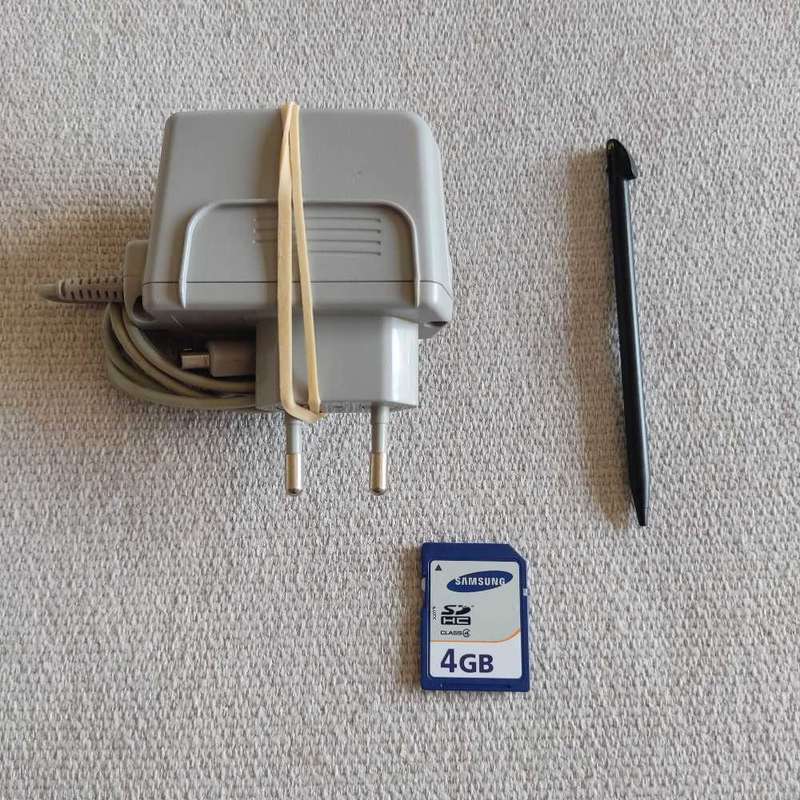 Nintendo 3Ds XL console with original charger