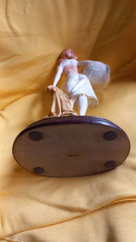 Vintage statue / sculpture of young girl holding a basket of fish - Simonelli  ?