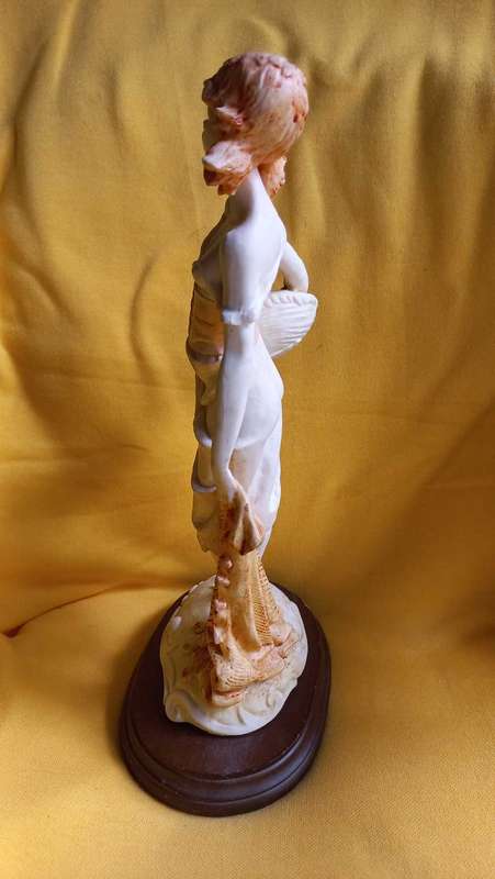 Vintage statue / sculpture of young girl holding a basket of fish - Simonelli  ?
