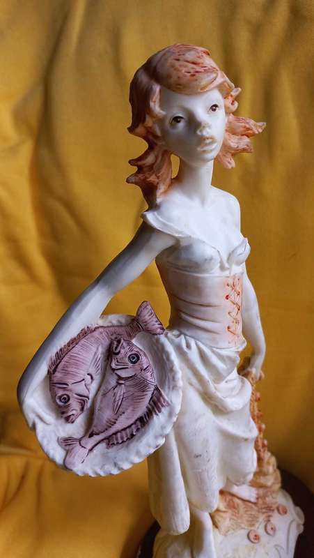Vintage statue / sculpture of young girl holding a basket of fish - Simonelli  ?