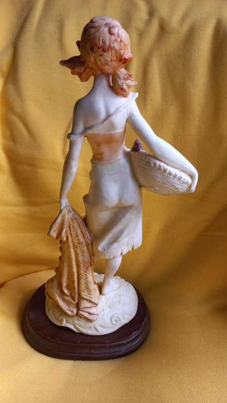 Vintage statue / sculpture of young girl holding a basket of fish - Simonelli  ?