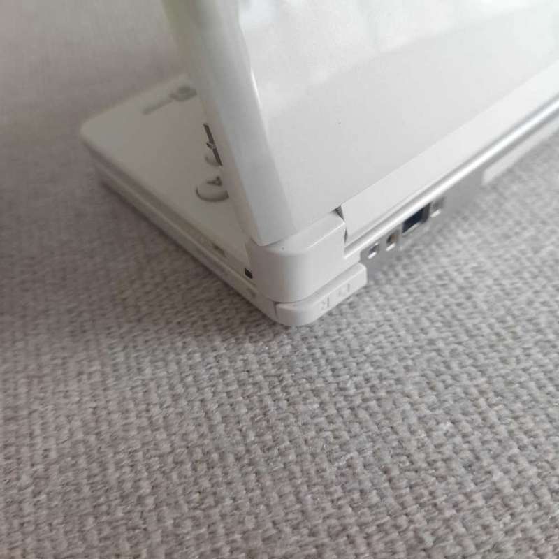 Nintendo 3ds console with charger and stylus