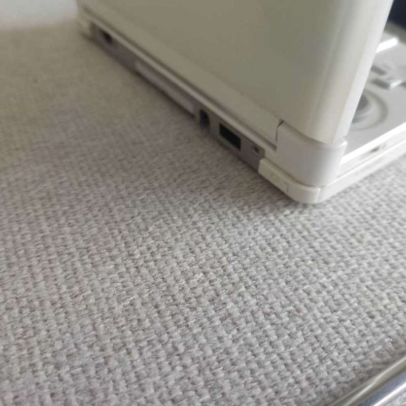 Nintendo 3ds console with charger and stylus