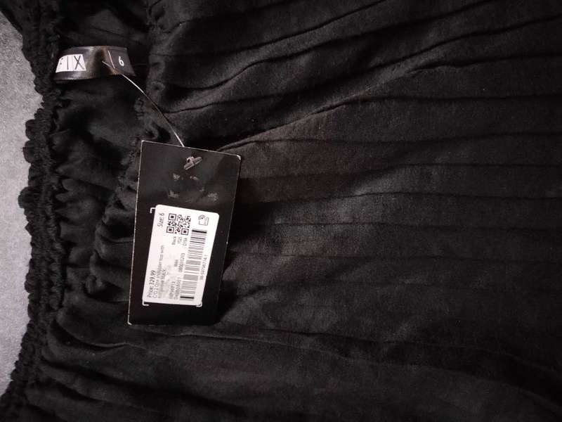 Various clothing and tech items