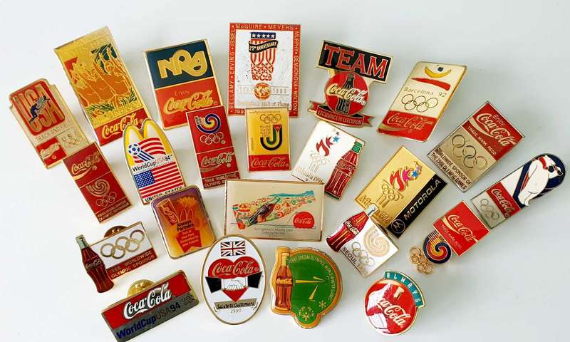23 COCA-COLA VINTAGE PINS - AS FROM 1988
