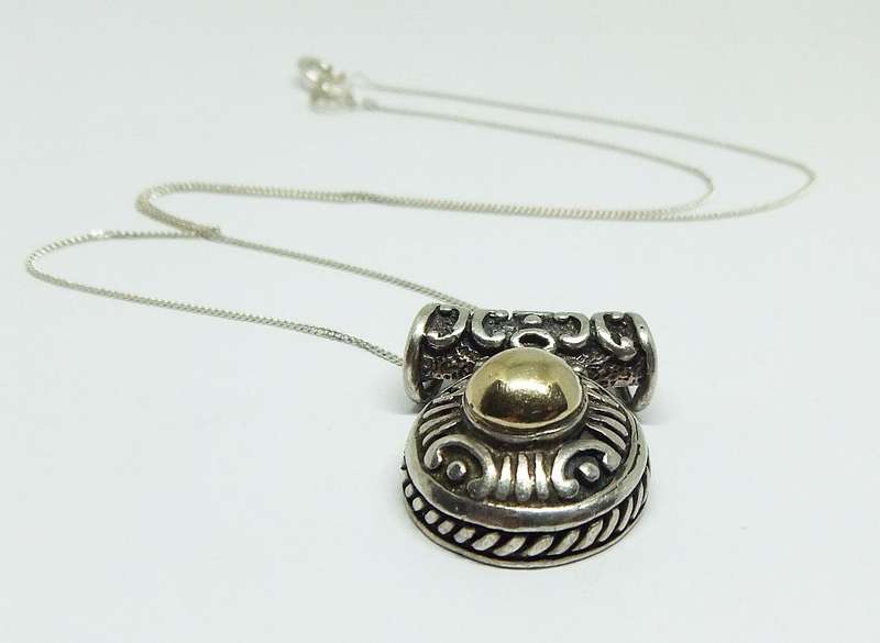 AWESOME FIND !! A SOLID STERLING SILVER PENDANT WITH GOLD ACCENT PLUS A STERLING SILVER NECKLACE !!