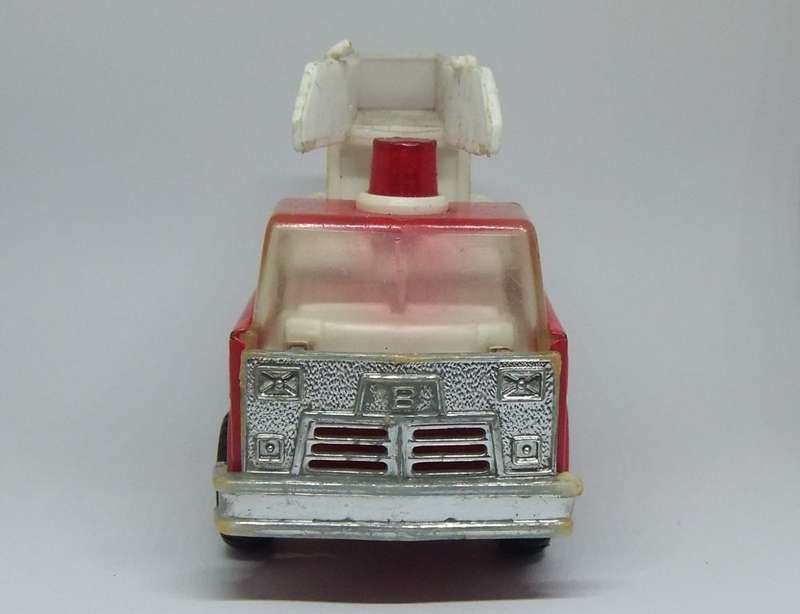 A VINTAGE MOSTLY METAL TOY FIRE TRUCK