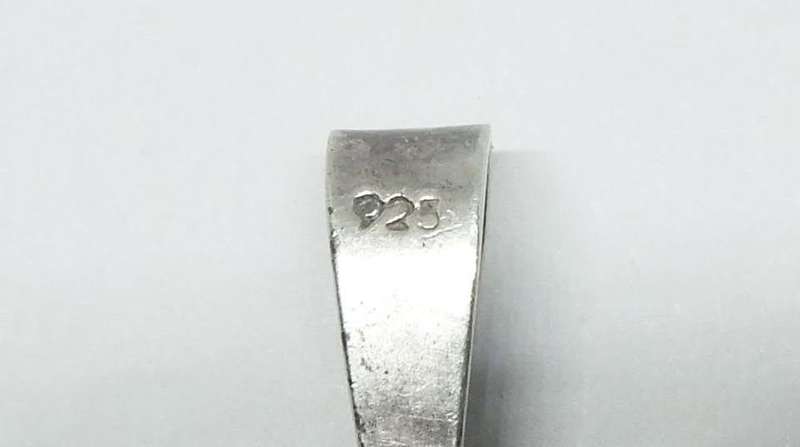 A VERY COOL WELL MADE VINTAGE 1981 ONE RAND COIN PENDANT SET IN A GENUINE STERLING SILVER FRAME