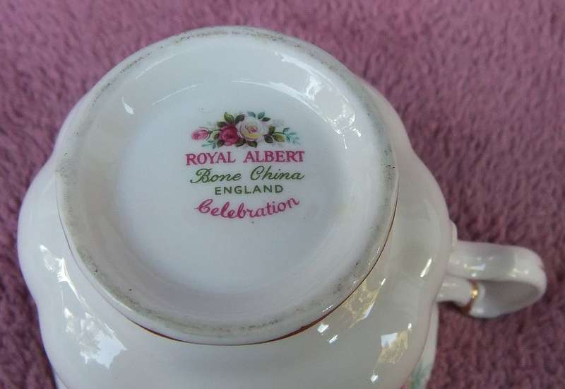 A VINTAGE ROYAL ALBERT DUO - CUP & SAUCER IN THE CELEBRATION PATTERN