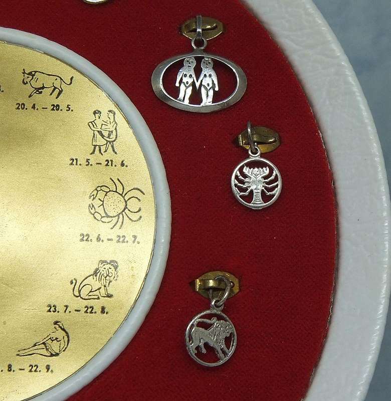 A FASCINATING LOT OF 12 VINTAGE UNWORN STERLING SILVER ZODIAC CHARMS & PENDANTS !! BID FOR ALL !!