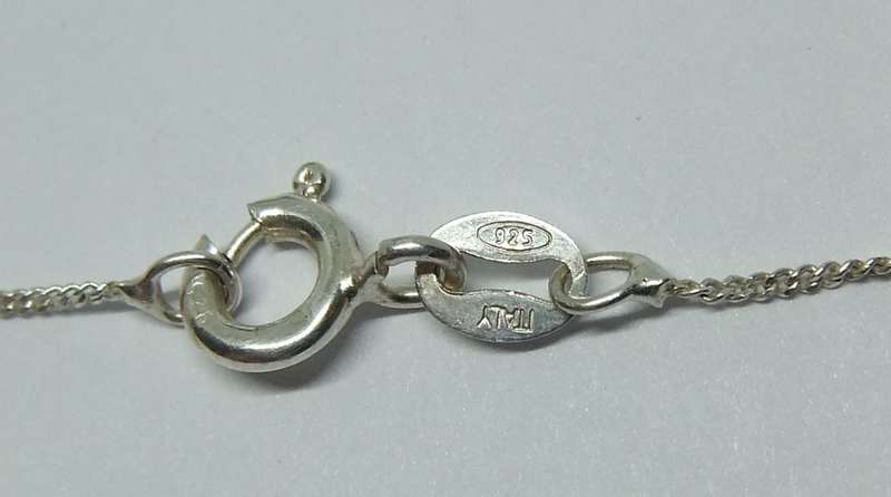 AWESOME FIND !! A SOLID STERLING SILVER PENDANT WITH GOLD ACCENT PLUS A STERLING SILVER NECKLACE !!