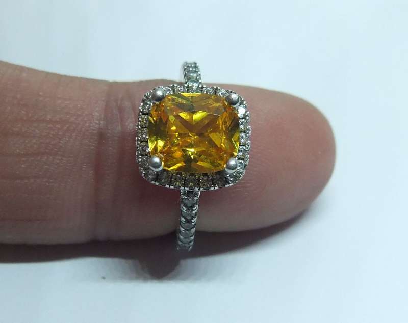 WOW !! AN ABSOLUTELY GORGEOUS AND PETITE SOLID STERLING SILVER RING WITH FACETED INSETS !!
