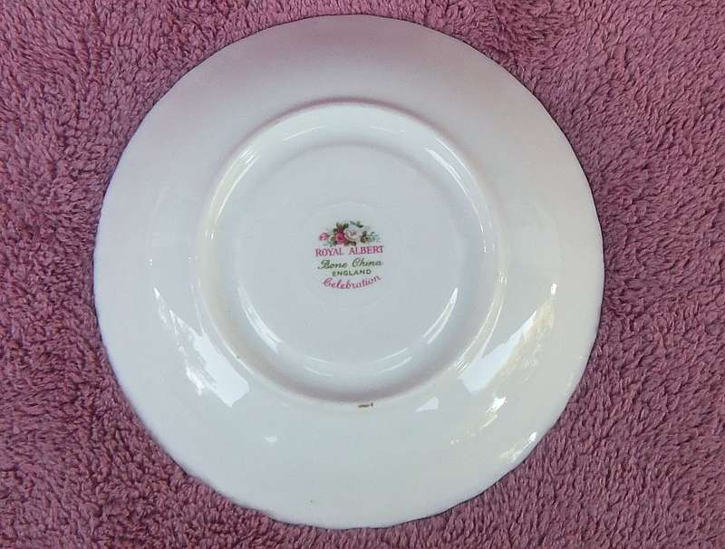 A VINTAGE ROYAL ALBERT DUO - CUP & SAUCER IN THE CELEBRATION PATTERN