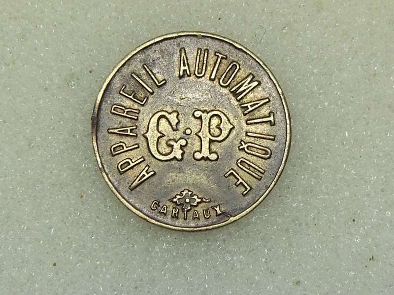 AN OLD 20 CENTIMES FRENCH CONSUMER TOKEN