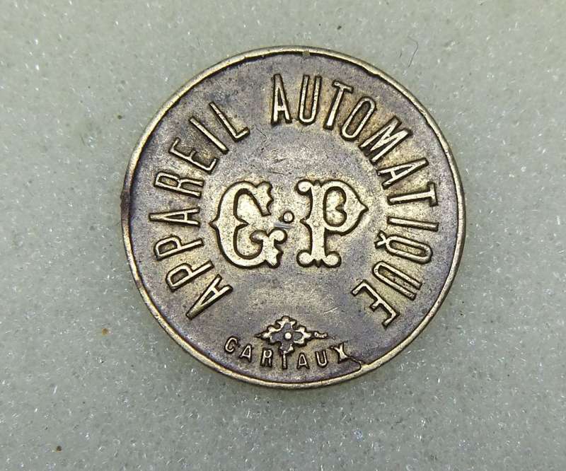 AN OLD 20 CENTIMES FRENCH CONSUMER TOKEN