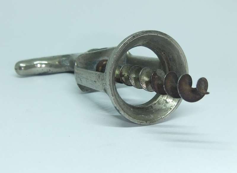 A VINTAGE METAL CORKSCREW MADE BY LADOR OF SWITZERLAND