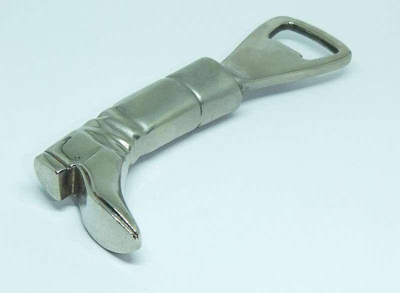A VINTAGE SOLID METAL BOOT FORM BOTTLE OPENER
