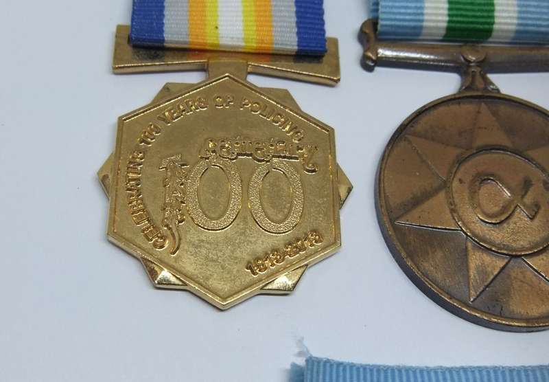COOL FIND !! A LOT OF FOUR POLICE RELATED MEDALS WITH ORIGINAL RIBBONS IN GREAT CONDITION !!