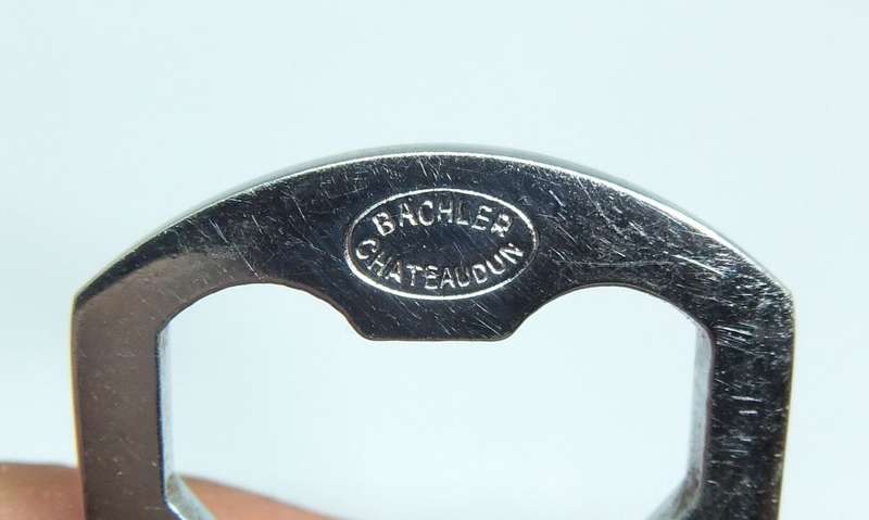 A VINTAGE SOLID METAL BOTTLE OPENER MADE FOR " AIR FRANCE "