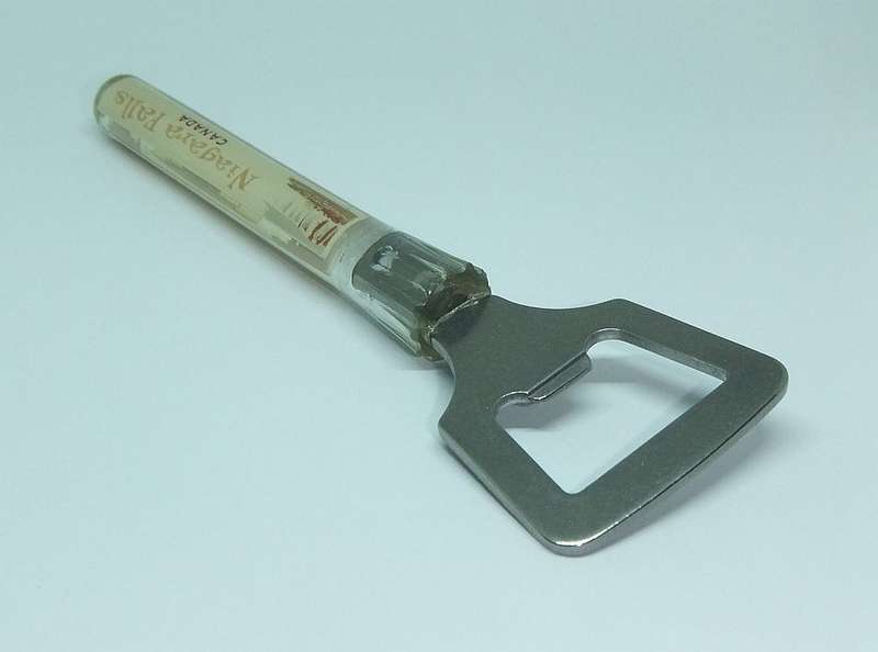 A VINTAGE BOTTLE OPENER FROM THE NIAGARA FALLS CANADA WITH MOVING BOAT FEATURE