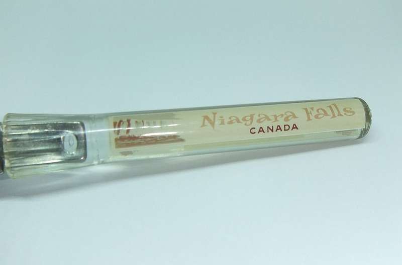 A VINTAGE BOTTLE OPENER FROM THE NIAGARA FALLS CANADA WITH MOVING BOAT FEATURE