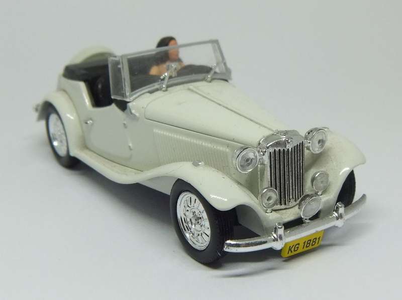 A 1:43 SCALE DIE CAST METAL MODEL OF THE MP LAFER WITH DRIVER