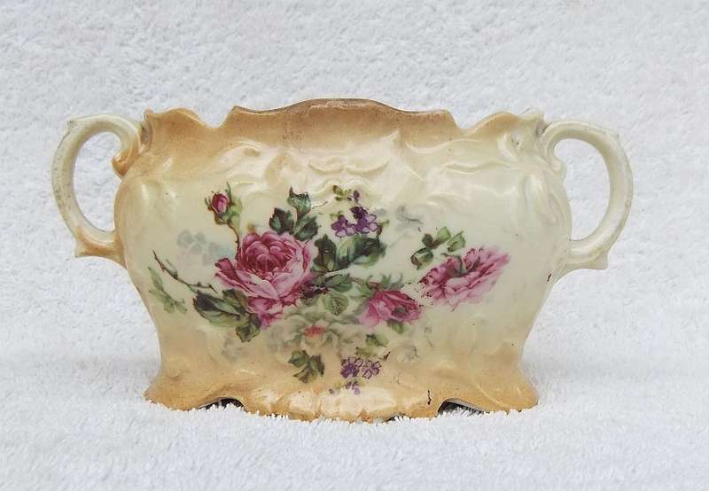 A RARE VICTORIAN ERA BLUSH WARE TWIN HANDLED JARDINIERE WITH FLORAL MOTIF