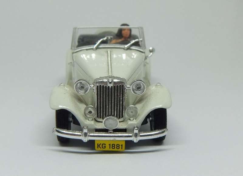A 1:43 SCALE DIE CAST METAL MODEL OF THE MP LAFER WITH DRIVER