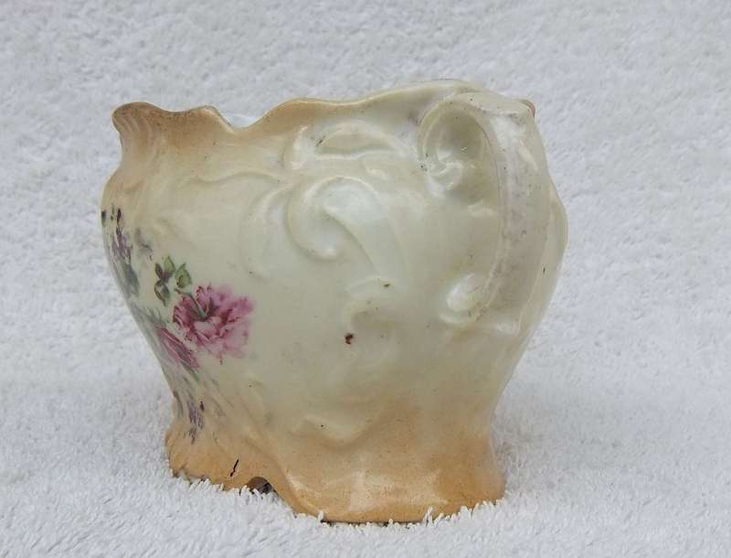 A RARE VICTORIAN ERA BLUSH WARE TWIN HANDLED JARDINIERE WITH FLORAL MOTIF