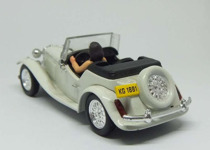 A 1:43 SCALE DIE CAST METAL MODEL OF THE MP LAFER WITH DRIVER