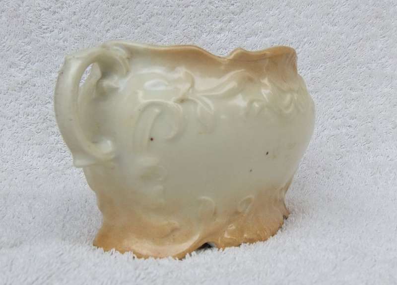 A RARE VICTORIAN ERA BLUSH WARE TWIN HANDLED JARDINIERE WITH FLORAL MOTIF