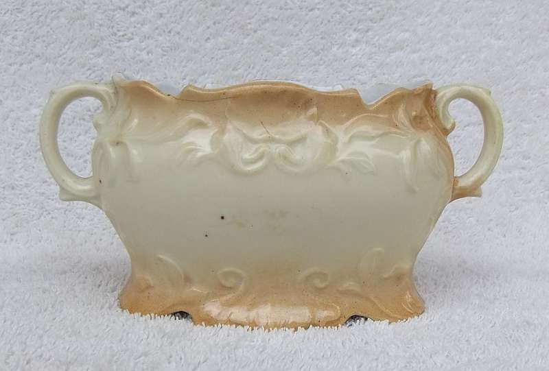 A RARE VICTORIAN ERA BLUSH WARE TWIN HANDLED JARDINIERE WITH FLORAL MOTIF