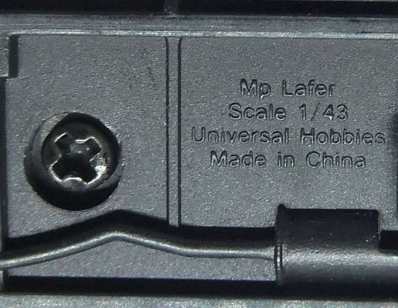 A 1:43 SCALE DIE CAST METAL MODEL OF THE MP LAFER WITH DRIVER