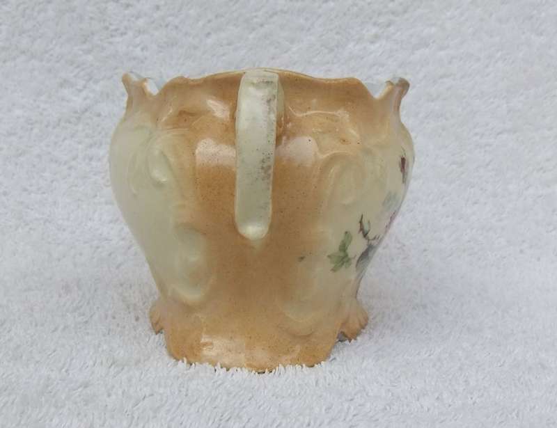 A RARE VICTORIAN ERA BLUSH WARE TWIN HANDLED JARDINIERE WITH FLORAL MOTIF