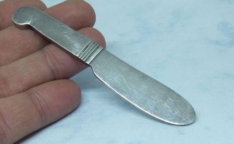 A SUPERIOR QUALITY FRENCH SILVERPLATE SPILL VASE AND PATE KNIFE BY CHRISTOFLE
