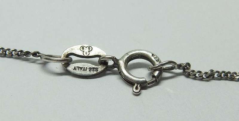 A VINTAGE ITALIAN STERLING SILVER NECKLACE WITH A SOLID GERMAN " 835 "SILVER GOAT PENDANT