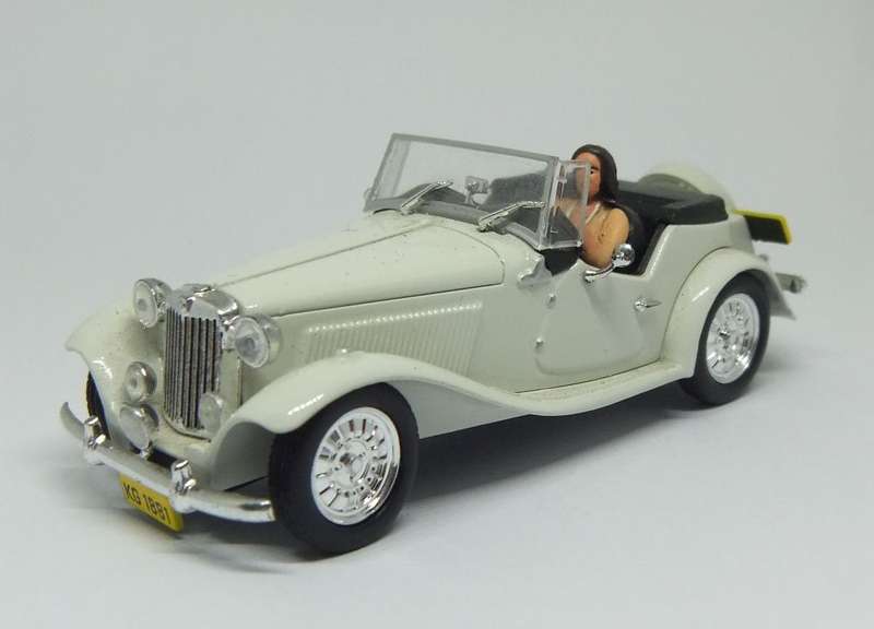 A 1:43 SCALE DIE CAST METAL MODEL OF THE MP LAFER WITH DRIVER