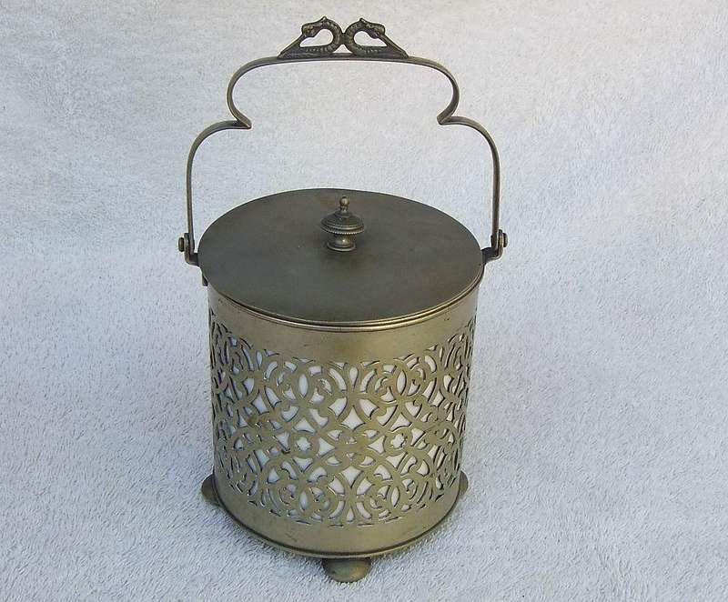A VICTORIAN ERA PORCELAIN JAR WITH METAL FRAME , HANDLE AND LID MARKED EPNS