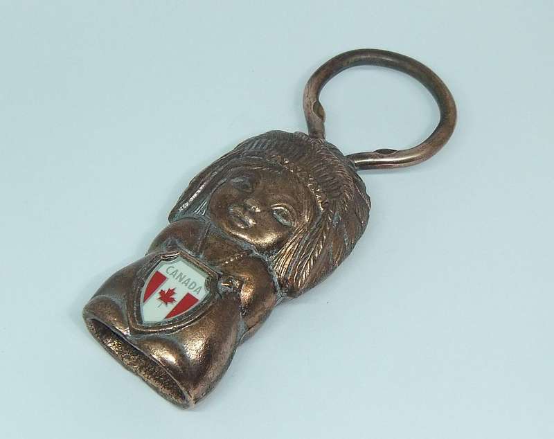 A VINTAGE CANADIAN FIGURAL BOTTLE OPENER