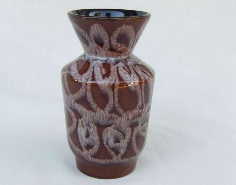 A vintage 1970`s Pottery vase with original stickers still attached made in Austria