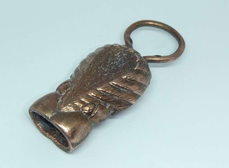 A VINTAGE CANADIAN FIGURAL BOTTLE OPENER