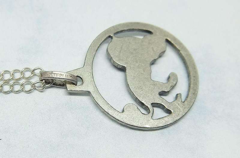 A BRAND NEW STERLING SILVER NECKLACE WITH A VINTAGE STERLING SILVER LION PENDANT MADE IN GERMANY