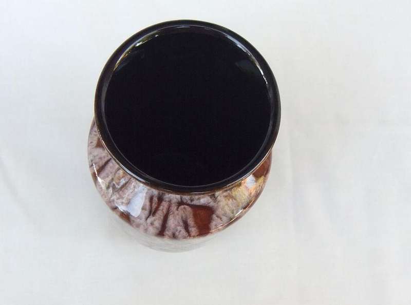 A vintage 1970`s Pottery vase with original stickers still attached made in Austria