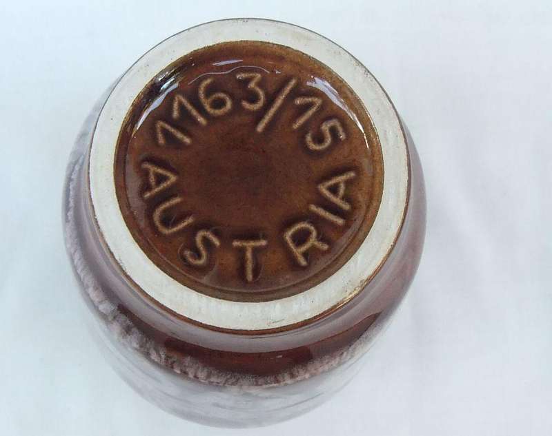 A vintage 1970`s Pottery vase with original stickers still attached made in Austria