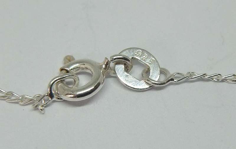 A CHARMING STERLING SILVER HEART PENDANT WITH FACETED INSET PLUS A STERLING SILVER NECKLACE !!